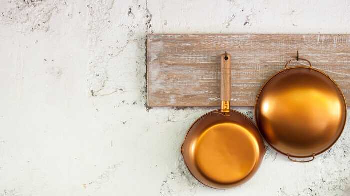 copper pans on hooks