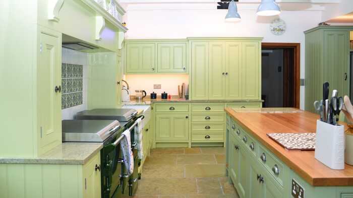 Green kitchen island with cupboards Green kitchen island with cupboards